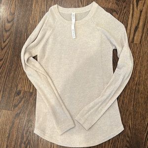 LuluLemon cream Marino wool sweater size 6